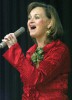 Laura Martin led the carolling Sunday during the 46th Rotary Carol Festival.