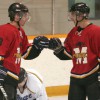 Tyce Gallamore and Cole Matson of the Fort Macleod Mustangs celebrate a goal Friday night against Kainai Chiefs.