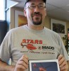 mike bourassa displays plaque
