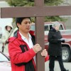Ronald Montemayor carries cross