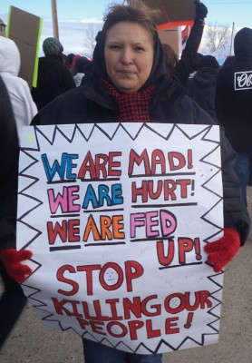 Members of the Blood Tribe marched from Moccasin Flats to the Moses Lake Community Center. 