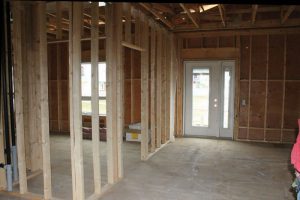 The interior of one of the suites, with doors opening to an adjacent patio.