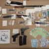 drug bust seized weapons cash