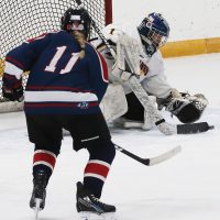 Havre Ice Hawks goalie Sean Nagel stops a shot from Layne Sharratt (11) of the Fort Macleod Mavericks.